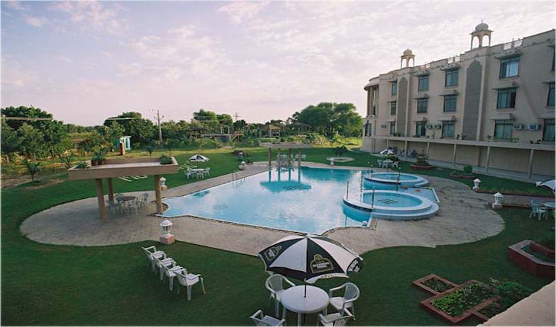 Swimming in Hotel Gold Palace And Resorts